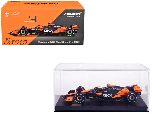 Model car of a McLaren Formula 1 car in front of its packaging