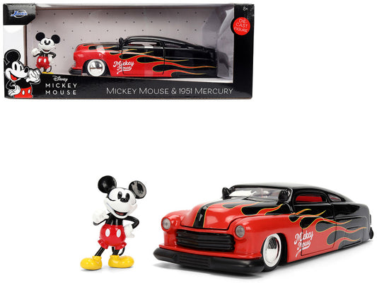 Model car and figure of Mickey Mouse in packaging with Disney branding