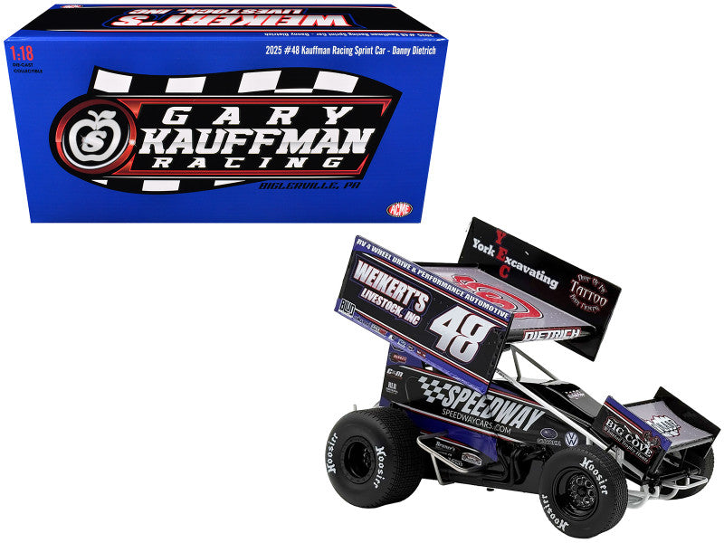 Model race car with sponsor logos in front of Gary Kauffman Racing packaging