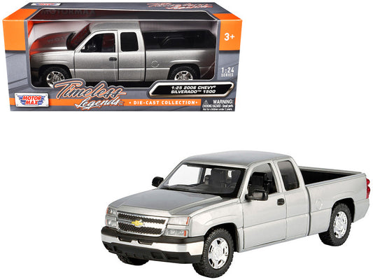 Model truck in front of its packaging