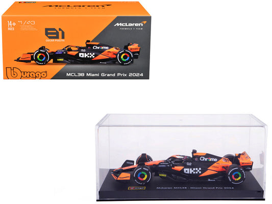 Model Formula 1 car with McLaren branding and Bburago packaging on a white background