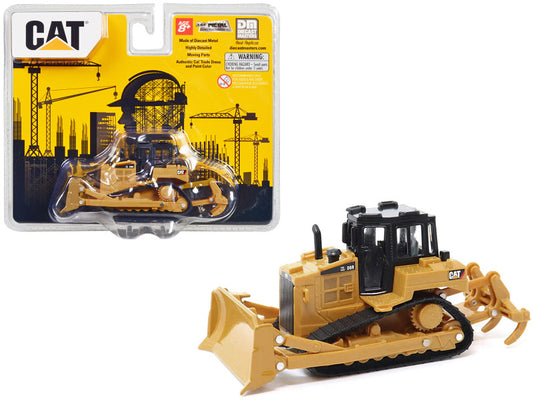 Toy bulldozer with packaging featuring the Caterpillar logo on a white background
