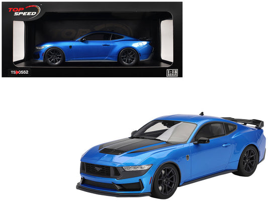 Blue sports car model with black roof and black wheels, displayed in a Top Speed packaging box.