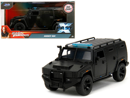 A diecast model of a black Agency SUV from the 'Fast & Furious' movie series, featuring details such as opening doors and a detailed interior.