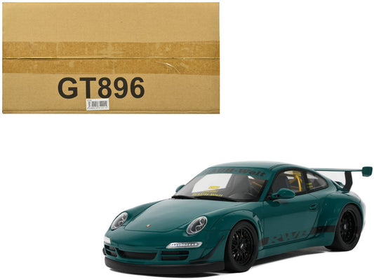 Green model car in front of a cardboard box with 'GT896' on it