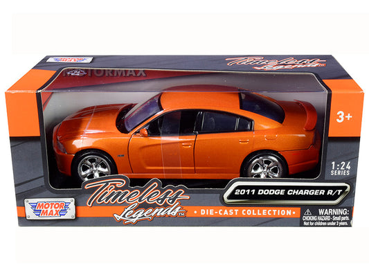 Orange Dodge Charger R/T model car in packaging with 'Motor Max' branding