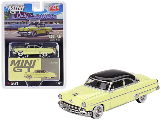 Yellow and black classic car model with packaging on a white background