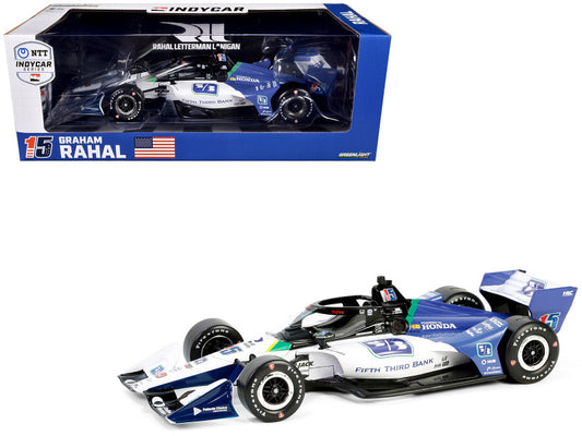 A diecast model of the Dallara IndyCar driven by Graham Rahal, number 15, in white, blue, and red livery with chrome accents, packaged in its original box.