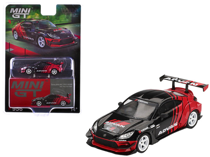 Red and black toy car with 'Mini GT' branding on a white background