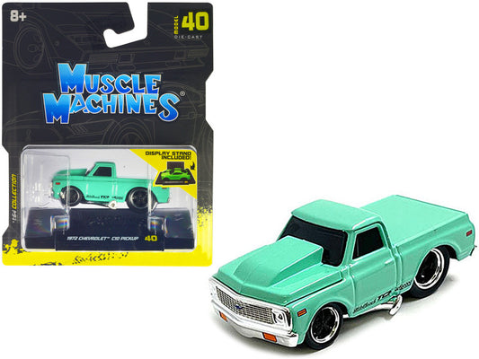 A diecast model of a 1972 Chevrolet C10 Pickup Truck in light green color, packaged in a blister pack with 'Muscle Machines' branding.