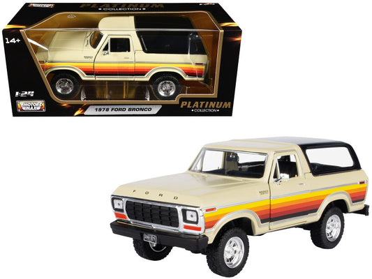 Model of a 1978 Ford Bronco with packaging on a white background