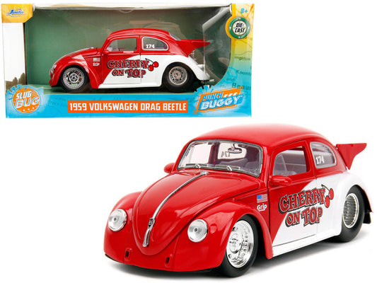A 1:24 scale diecast model of a 1959 Volkswagen Drag Beetle in red and white, with the box showing the model name and scale.