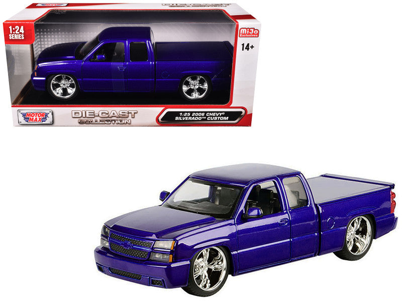 Blue diecast truck model with 'Motor Max' packaging on a white background