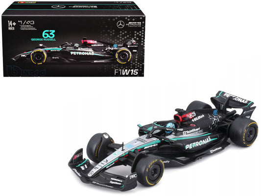 Model Formula 1 car with Petronas branding and packaging on a white background