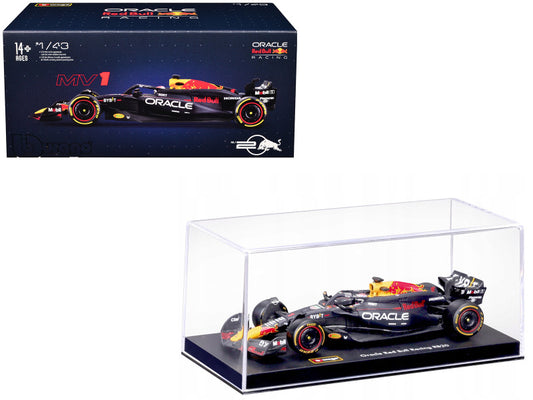 Model Formula 1 car with Oracle branding on a clear display stand, next to its packaging.