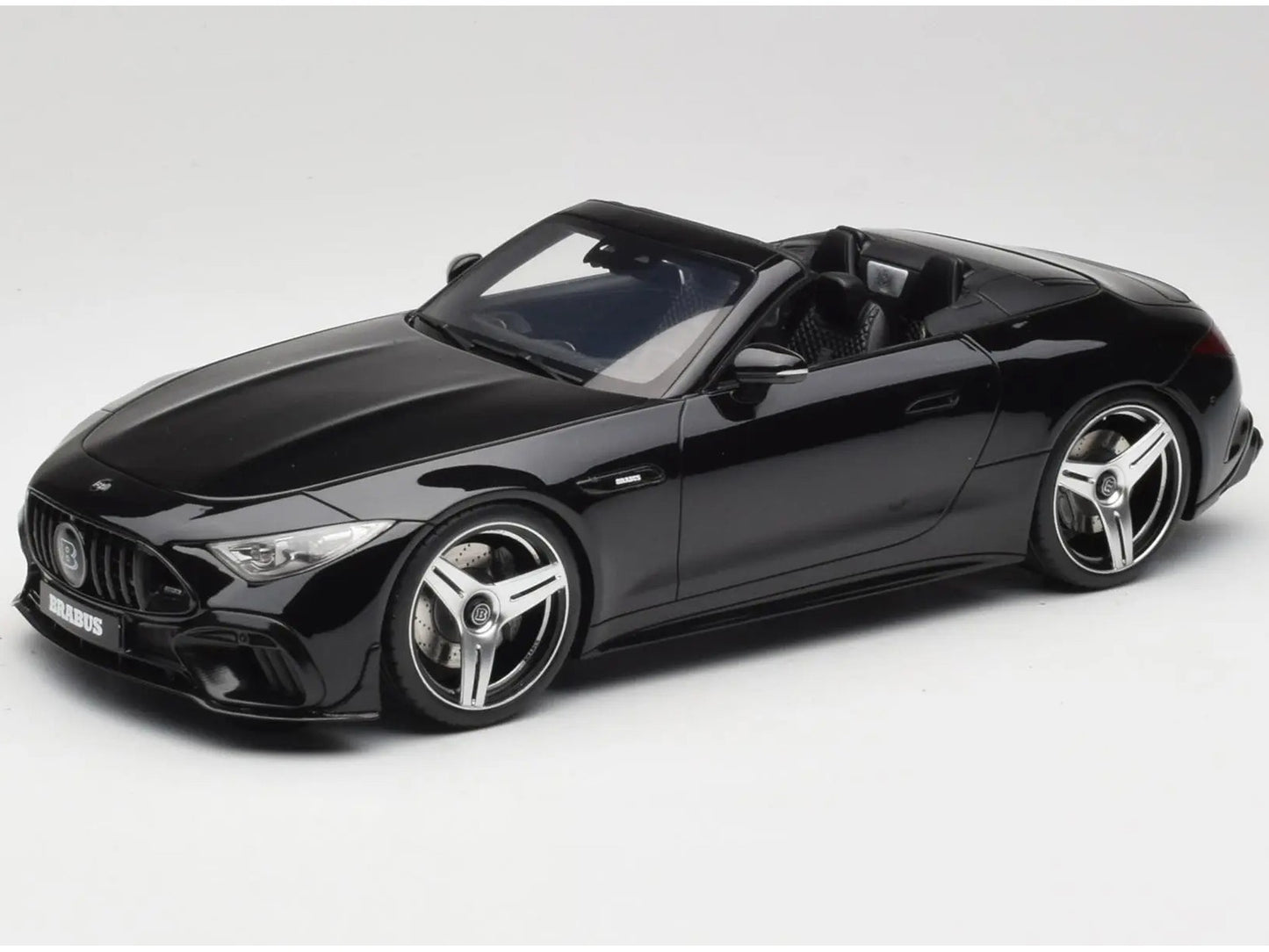 Black convertible car on a white background