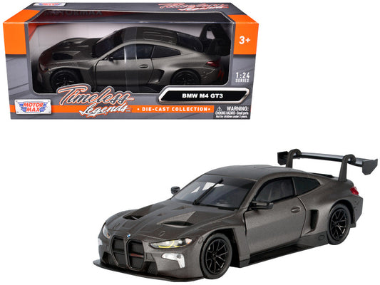Model car of BMW M4 GT3 in packaging with 'MotorMax' branding on a white background