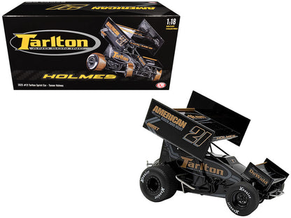Model race car with 'Tarlton' branding next to its packaging