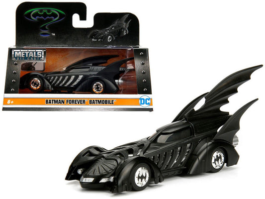 Black Batmobile toy car with packaging on a white background