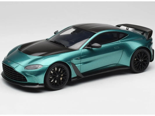 Teal sports car with black accents on a white background