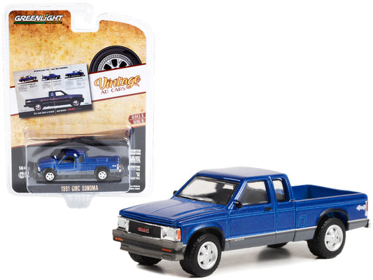 Blue pickup truck model in packaging with 'Greenlight' branding