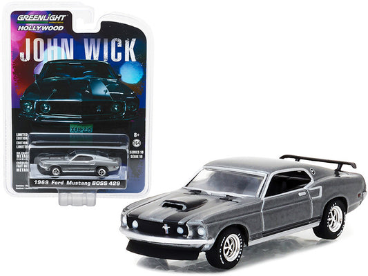 1969 Ford Mustang Boss 429 model car with John Wick packaging on a white background