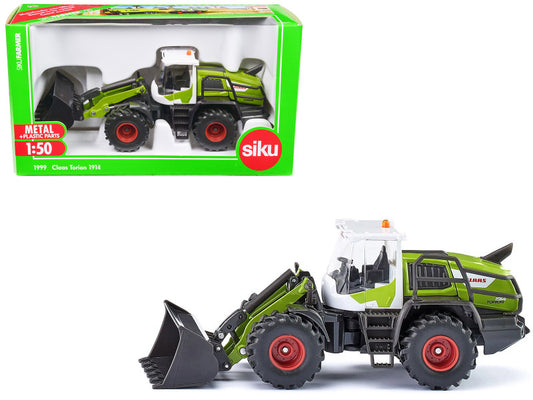 Toy tractor with packaging displaying Siku brand on a white background