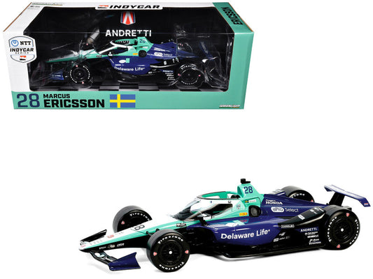 A diecast model of the Dallara IndyCar #28 Marcus Ericsson in Andretti Autosport livery, with the car displayed both in and out of its green and white box packaging.