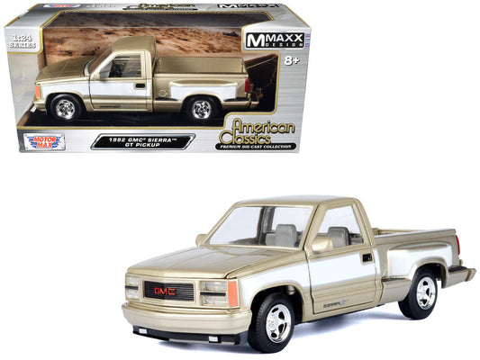 Model GMC Sierra pickup truck in packaging with 'Maxx' branding