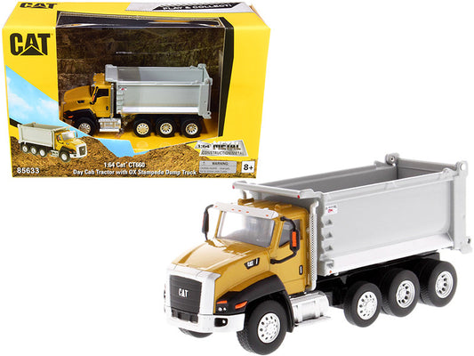 Toy dump truck with CAT branding on a white background