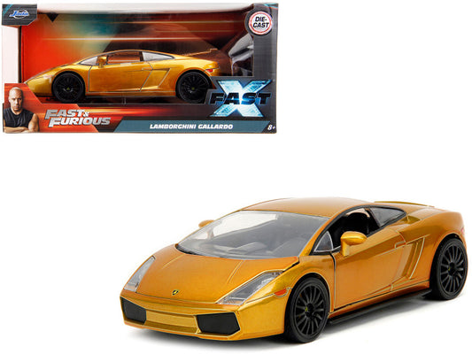Yellow Lamborghini Gallardo model car in front of its packaging, featuring 'Fast & Furious' branding.